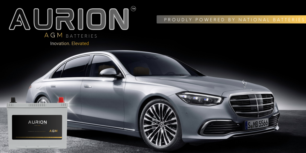 Aurion AGM batteries banner with a silver sedan, proudly powered by National Batteries