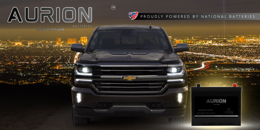 Aurion batteries banner with a black pickup at night, proudly powered by National Batteries